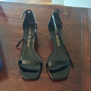 Stuart Weitzman black patent sandals.  Only worn twice
